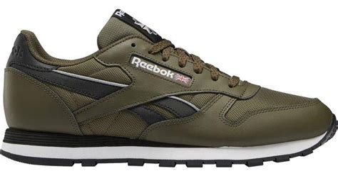 army green reebok shoes.